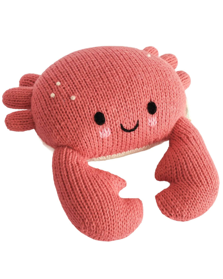 Hand-knit crab stuffed animal Cuddle + Kind Baby Crab, a soft ocean plush toy for babies