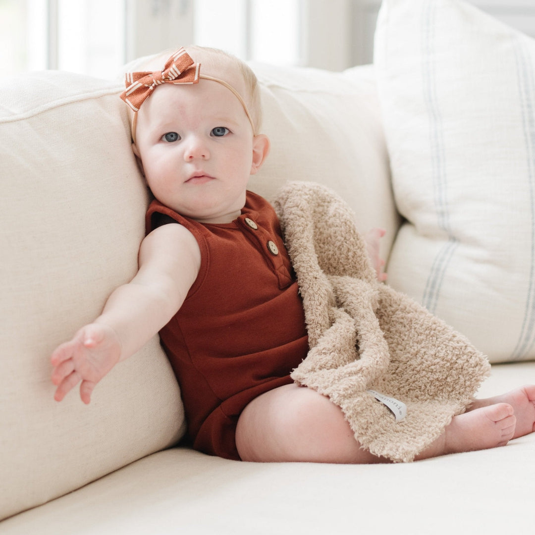 Keep your toddler cozy with the Saranoni BAMBONI¨ Mini Blanket in Taupe Ñ one of the best toddler blankets for comfort.