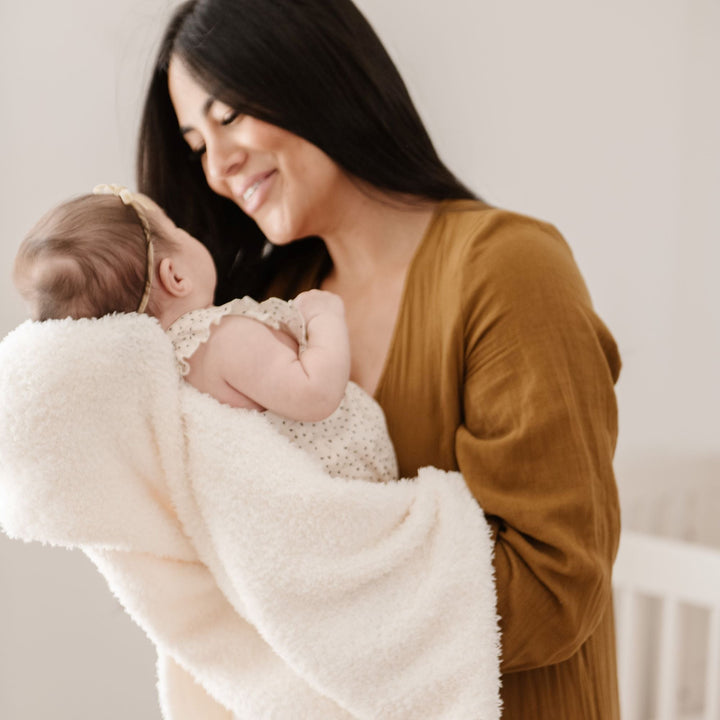 Saranoni BAMBONI¨ Mini Blanket in Ivory offers soothing coziness, an ideal baby boy blanket for daily snuggles.