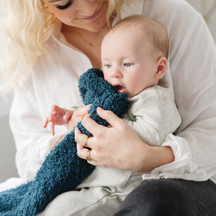 SaranoniÕs BAMBONI¨ Mini Blanket in Nautical Blue feels buttery soft Ñ truly the best baby blanket for cuddles and naps.