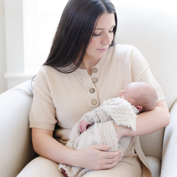 SaranoniÕs BAMBONI¨ Mini Blanket in Buttermilk combines comfort and style, one of the best blankets for toddler naps.