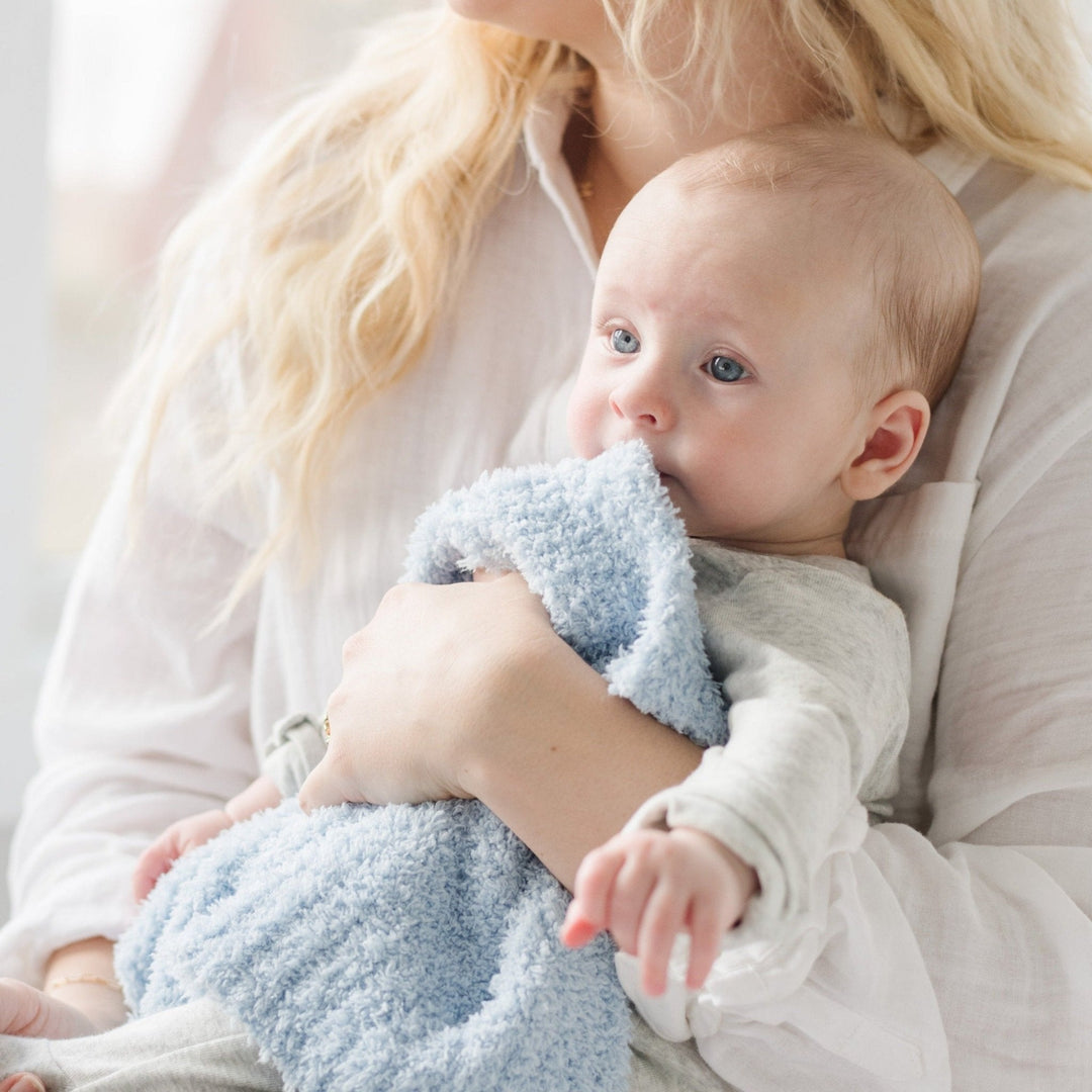 The Saranoni BAMBONI¨ Mini Blanket in Light Blue glows with comfort, one of the best baby blankets for cozy snuggles.