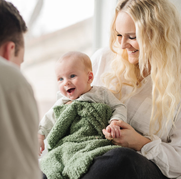 Luxuriously soft, the Saranoni BAMBONI¨ Mini Blanket in Olive makes every snuggle special Ñ truly the best baby blanket.