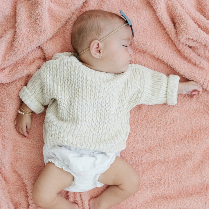 The Saranoni Bamboni¨ Receiving Blanket in Peach is ultra-soft and cozy Ñ one of the best baby blankets for gifting.