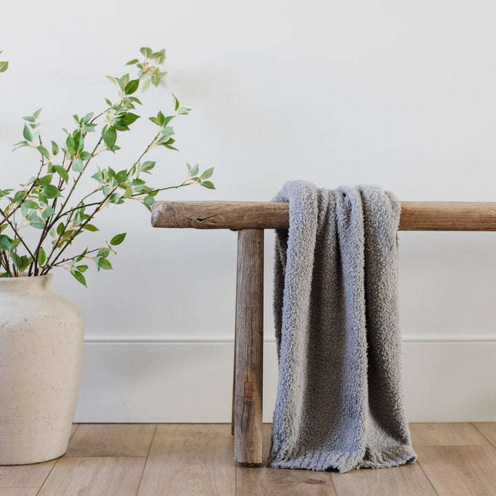 Keep your little one cozy in the Saranoni Bamboni¨ Receiving Blanket in Gray, a timeless baby boy blanket.