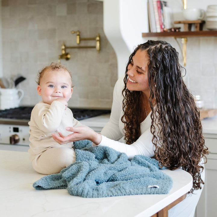 Saranoni Bamboni¨ Receiving Blanket in Spruce offers cozy comfort, the perfect baby blanket for everyday snuggles.