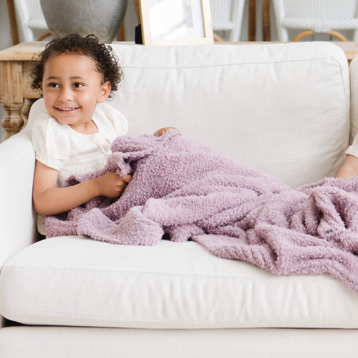 Soft and timeless, the Saranoni Bamboni¨ Receiving Blanket in Woodrose is a favorite among baby boy blankets.