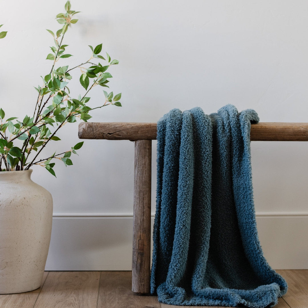 SaranoniÕs Bamboni¨ Receiving Blanket in Spruce delivers warmth and elegance, making it one of the best baby blankets.
