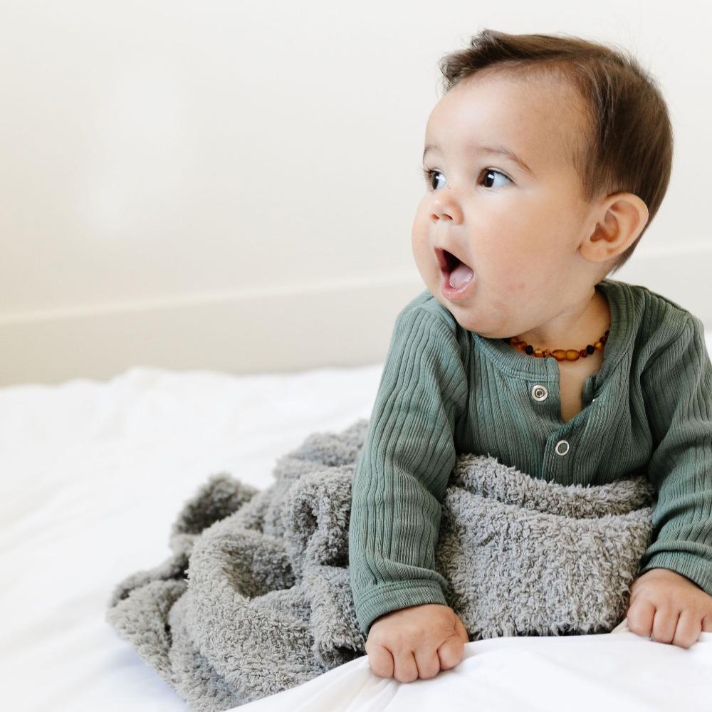 Experience luxurious comfort with the Saranoni Bamboni¨ Receiving Blanket in Gray, crafted for infant receiving blankets.