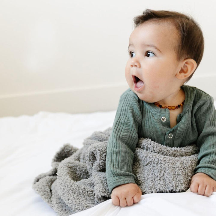 Experience luxurious comfort with the Saranoni Bamboni¨ Receiving Blanket in Gray, crafted for infant receiving blankets.