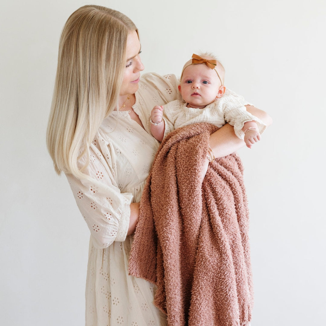 Saranoni Bamboni¨ Receiving Blanket in French Rose offers delicate luxury, a baby girl blanket designed for sweet cuddles.