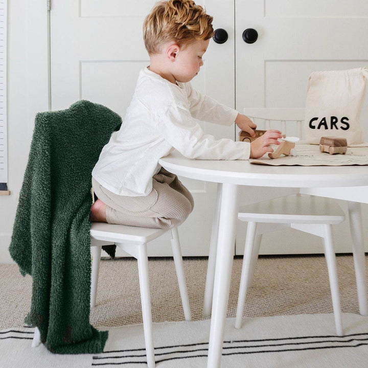 Made for snuggles, the Saranoni Bamboni¨ Receiving Blanket in Juniper offers a perfect blend of warmth and texture.