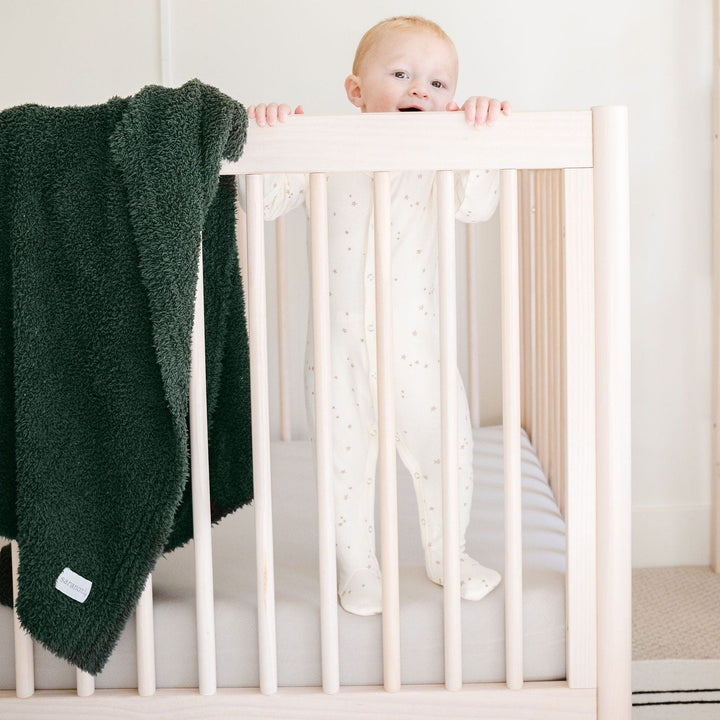 Add cozy charm with the Saranoni Bamboni¨ Receiving Blanket in Juniper, a soft and stylish baby boy blanket.