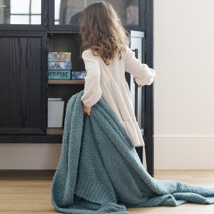 Little ones love the Spruce Saranoni BAMBONI¨ Toddler Blanket, a gentle baby blanket.