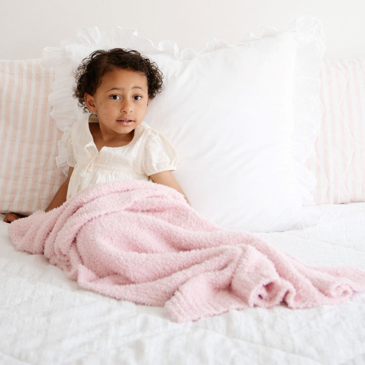 SaranoniÕs Light Pink BAMBONI¨ Toddler Blanket offers gentle warmth as one of the soft baby blankets.