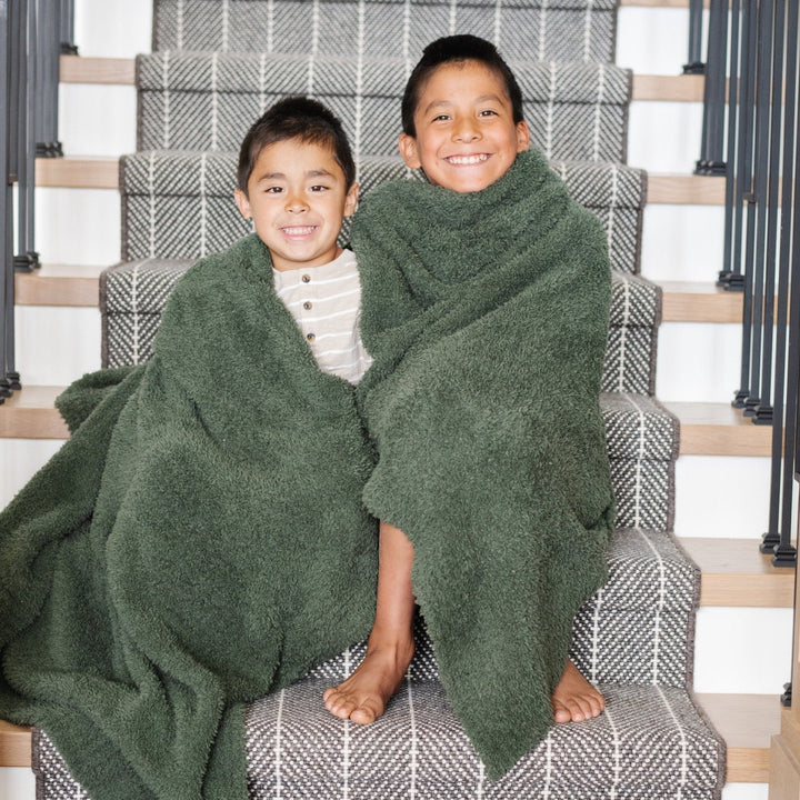 The Juniper BAMBONI¨ Toddler Blanket by Saranoni wraps toddlers in warmth, a best baby blanket.