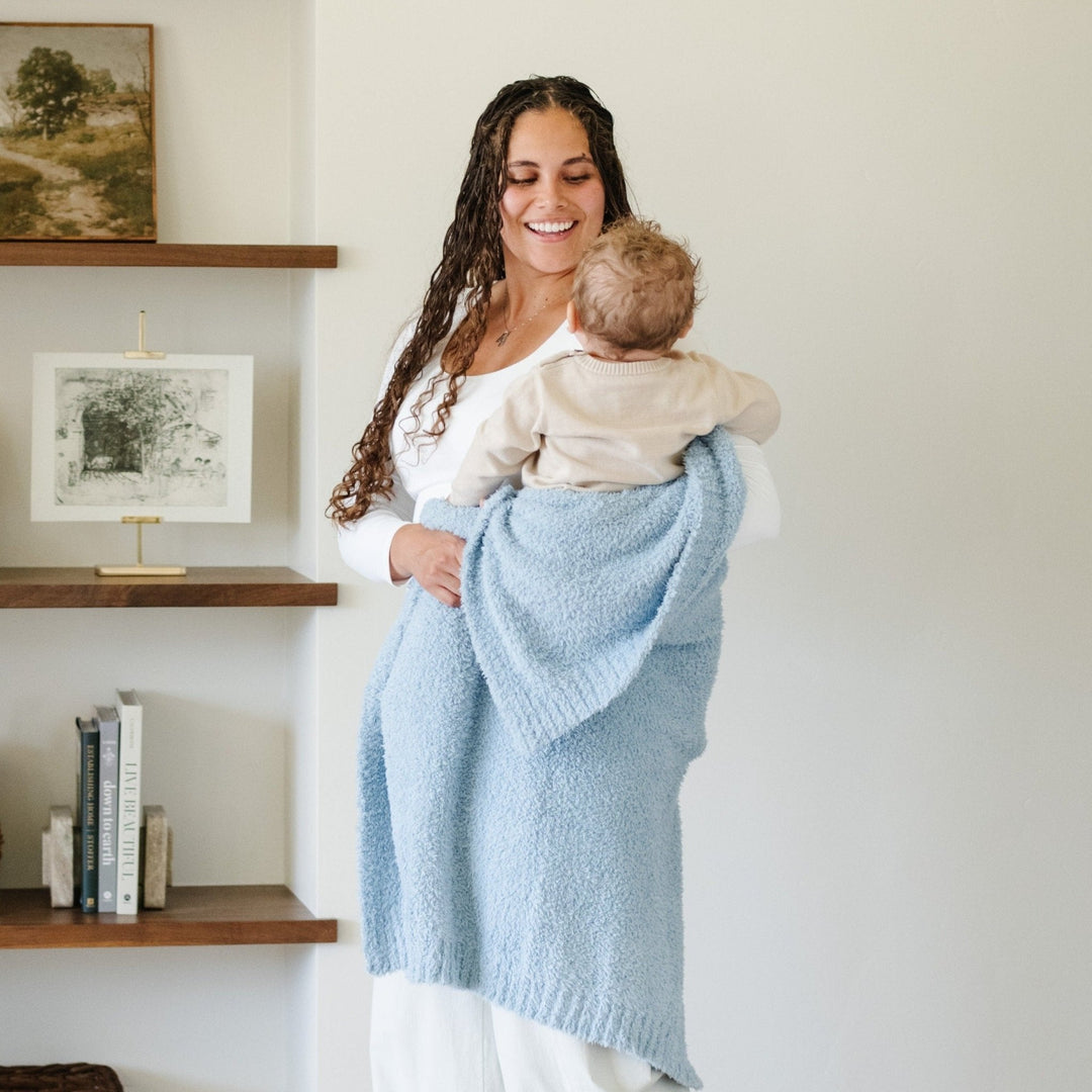 Soft Light Blue Saranoni BAMBONI¨ Toddler Blanket, a warm and cuddly addition to toddler blankets.