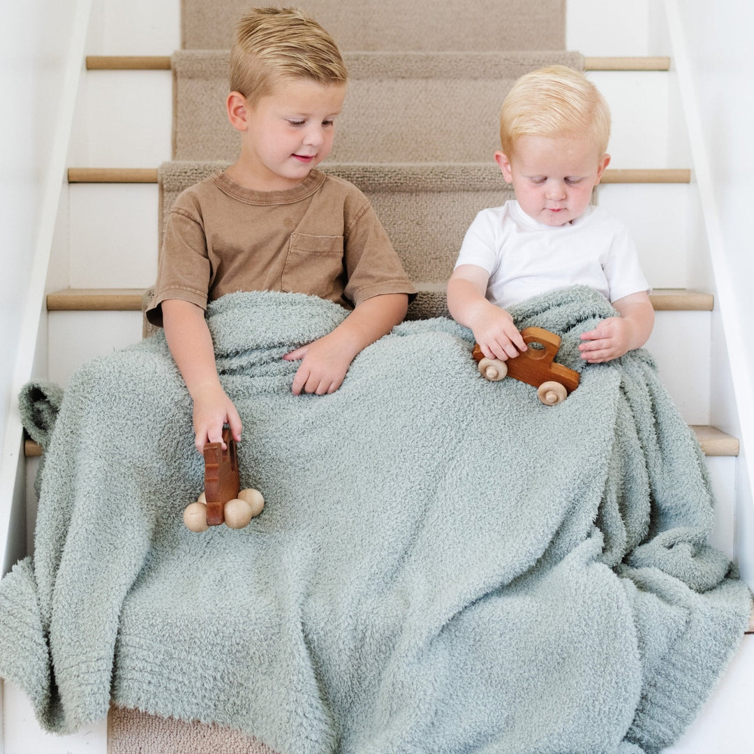 The Sage BAMBONI¨ Toddler Blanket by Saranoni makes nap time comfy as a baby boy blanket.