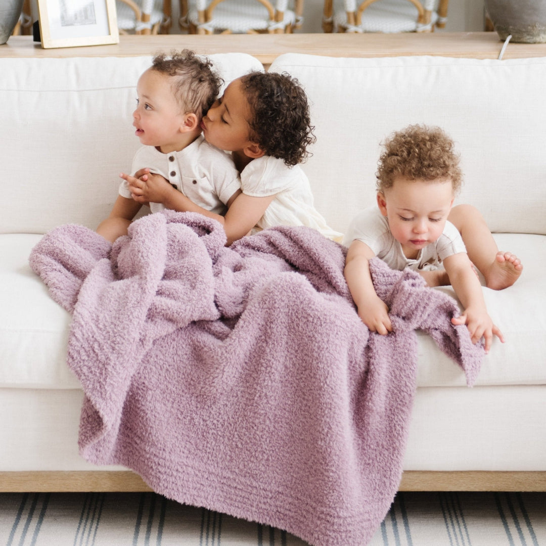 The Woodrose BAMBONI¨ Toddler Blanket from Saranoni offers unmatched comfort for best toddler blankets.