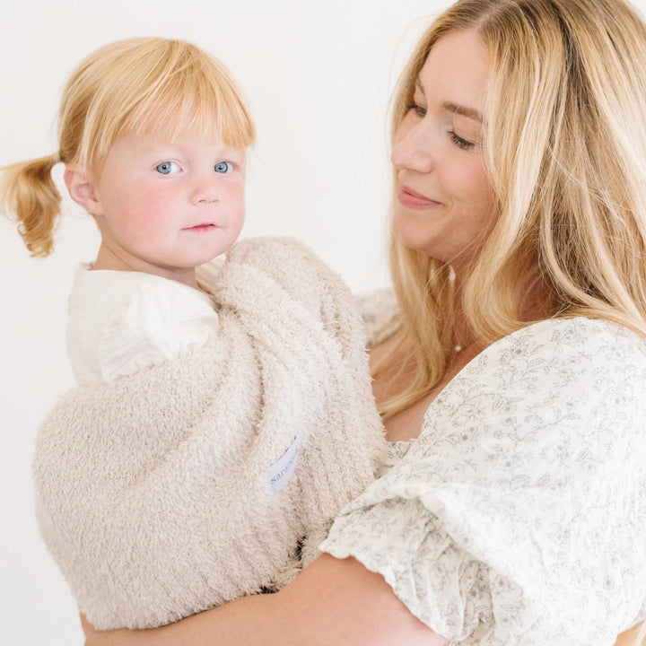 Wrap little ones in the Buttermilk BAMBONI¨ Toddler Blanket by Saranoni, a top best blankets for toddlers.