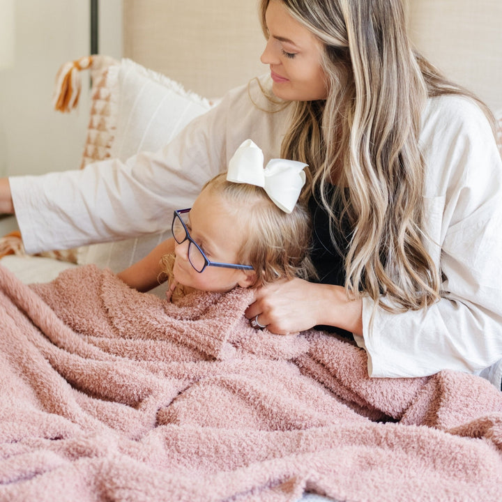 Soft French Rose Saranoni BAMBONI¨ Toddler Blanket ensures cozy comfort as a baby blanket for toddlers.