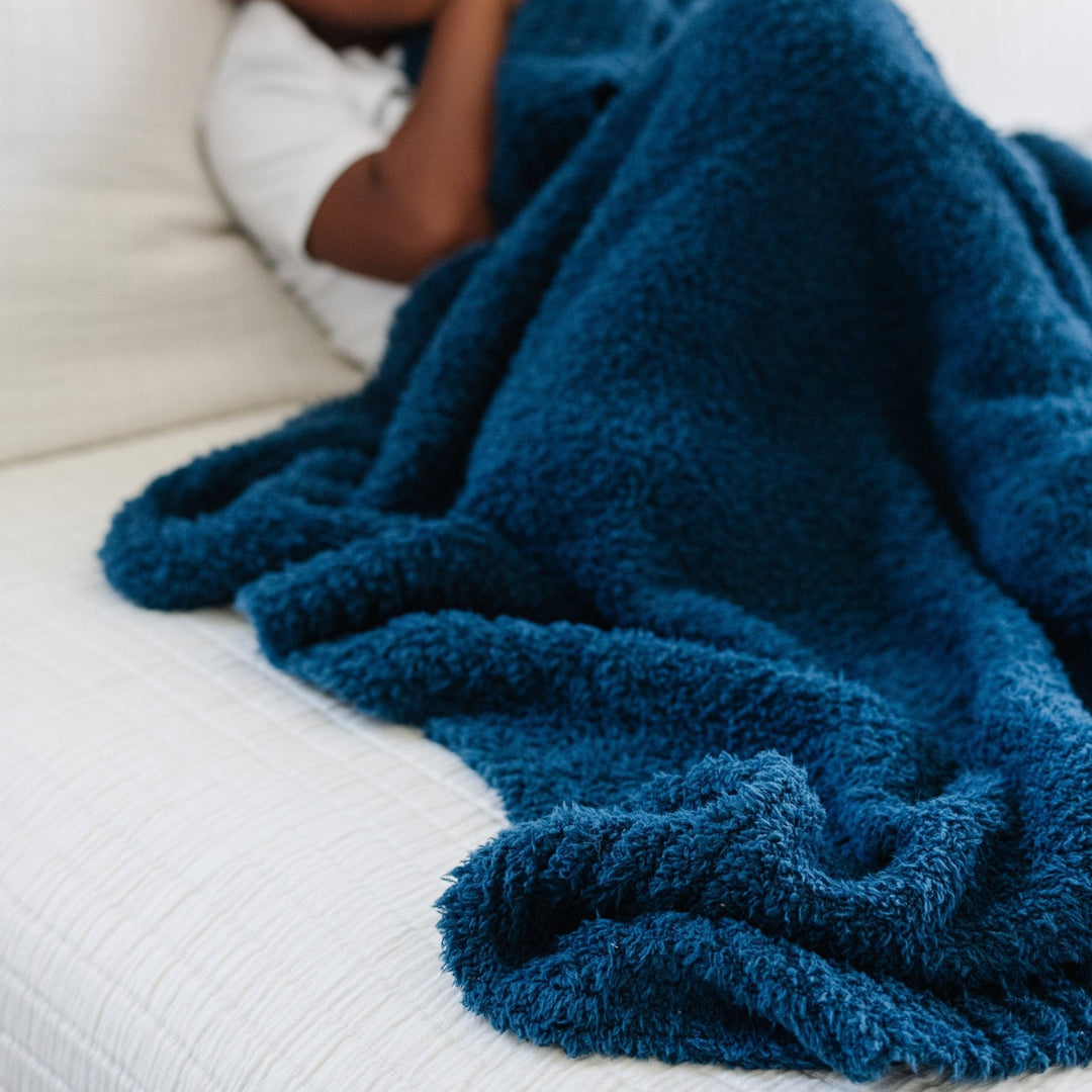 Soft and snuggly Nautical Blue Saranoni BAMBONI¨ Toddler Blanket, perfect for cozy moments as a best blankets for toddlers.