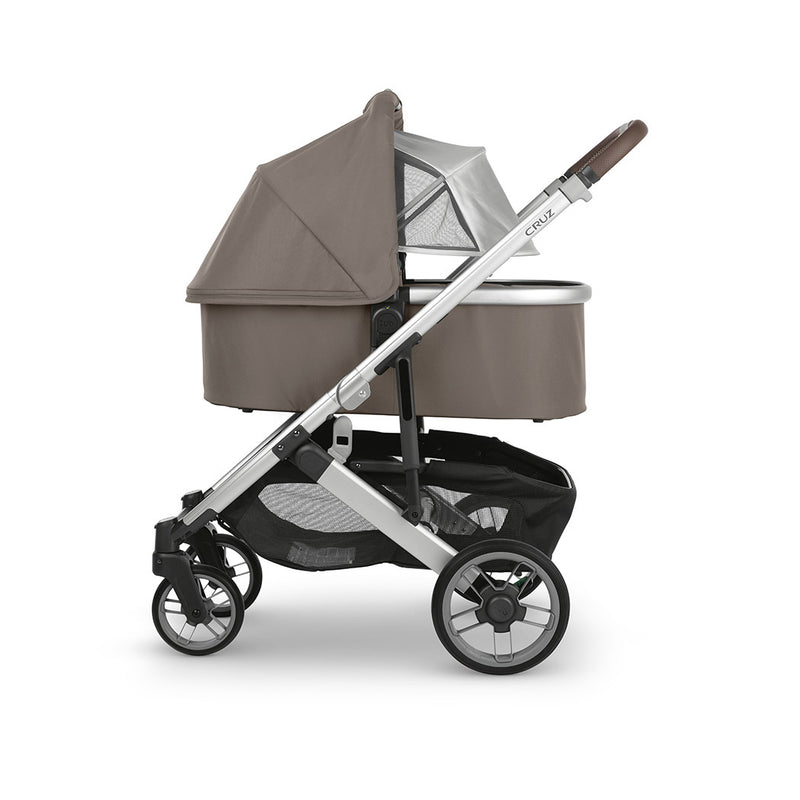 uppababy cruz stroller for newborns with bassinet and shade pulled theo