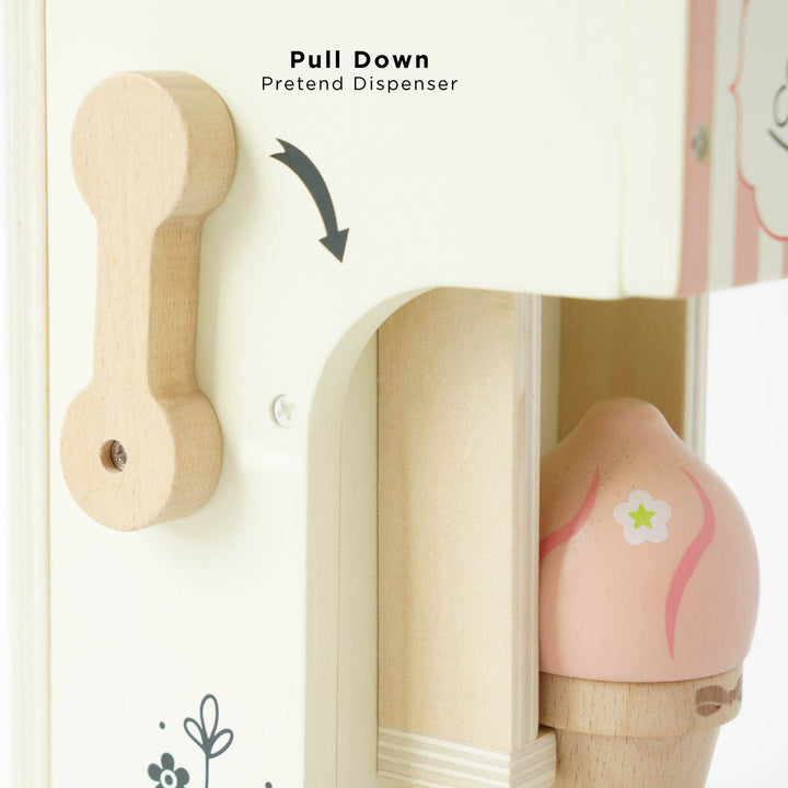 An arrow traces the pull down lever that operates the pretend dispenser on Le Toy Van's Ice Cream Machine