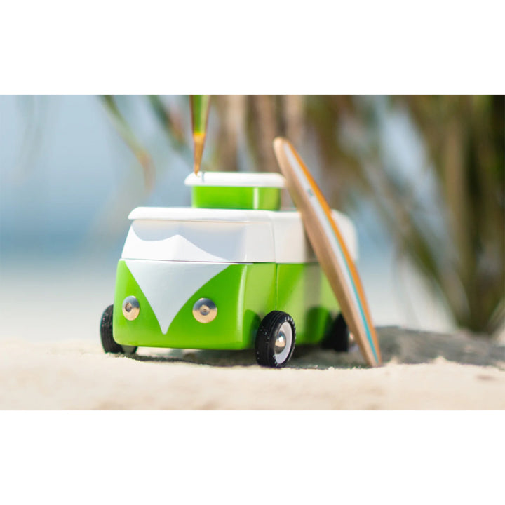 Wooden beach bus toy by Candylab, perfect for pretend vacations.