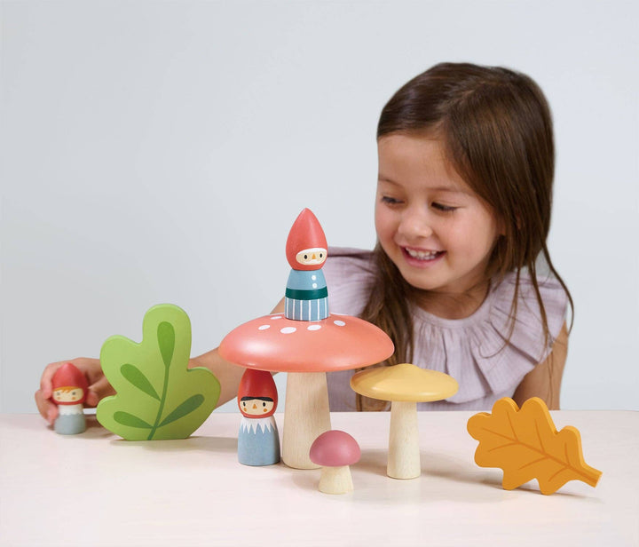 Tender Leaf Woodland Gnome Family A magical forest play set with three wooden gnomes, a leaf-shaped accessory, and a mushroom house for pretend adventures.