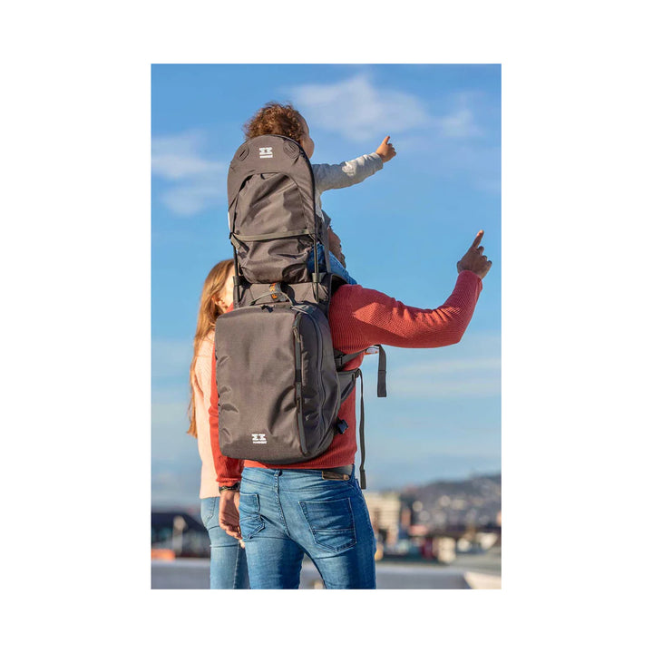 Grey/black shoulder carrier being used comfortably outside