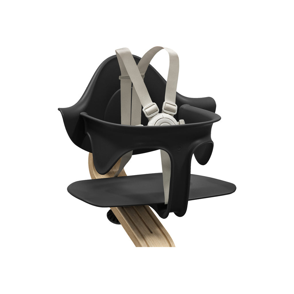 Close up of the black natural stokke nomi high chair.