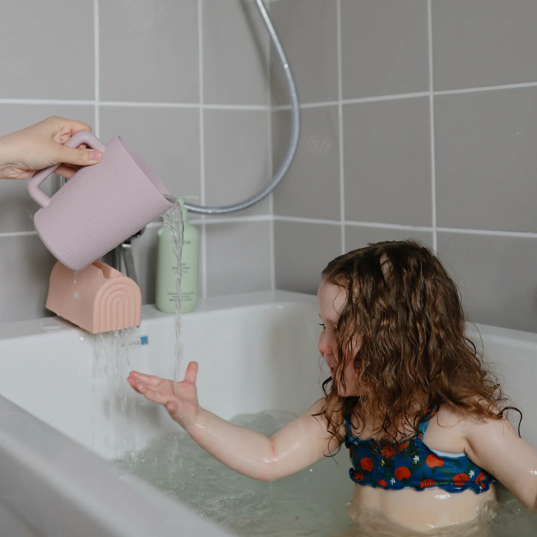 Mushie Princess bath kit accessories - silicone bath toys and spout cover styled for baby bath time