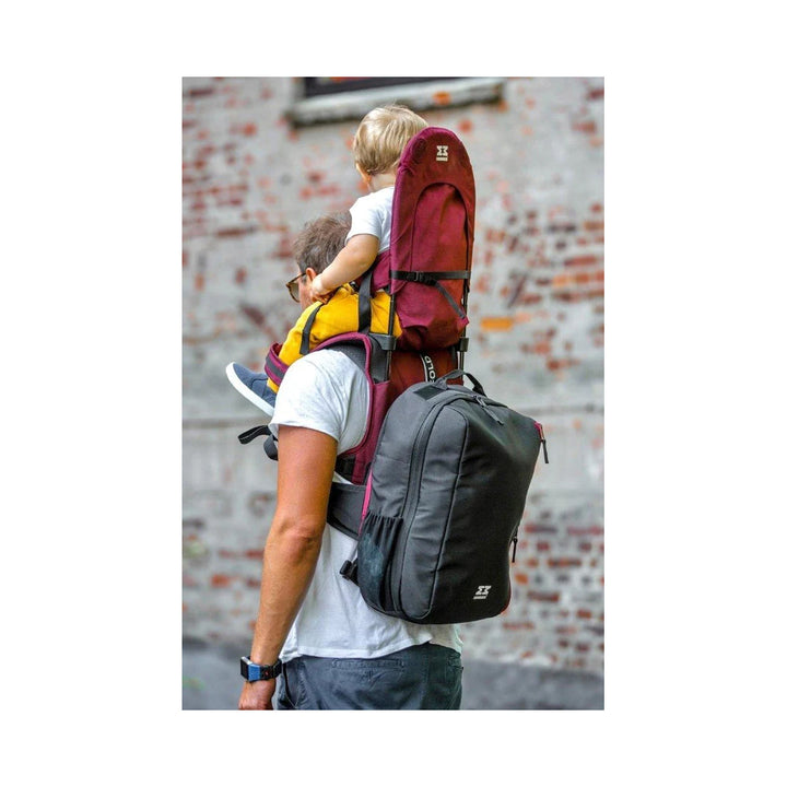 The backpack and shoulder carrier in burgundy