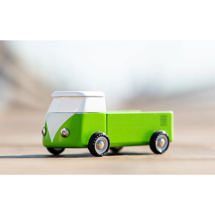 Beach-inspired wooden camper bus by Candylab, built for imagination.