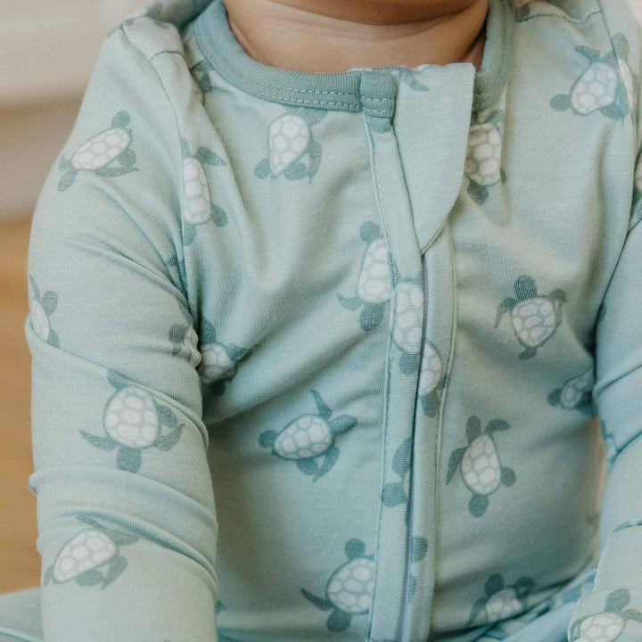 Close up of Copper Pearl Wade baby pajamas fabric, breathable infant sleepwear for sensitive skin and comfort