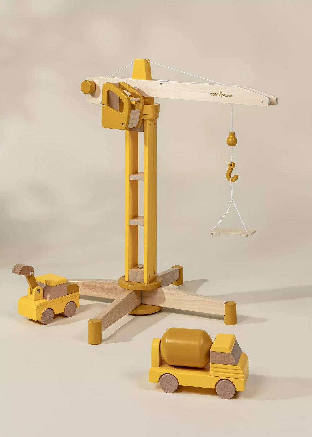 Lift, lower, and build with the Coco Village Oversized Wooden Construction Crane, a beautifully designed large wooden toy for young engineers.