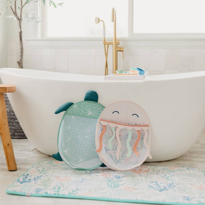 Copper Pearl bath toy organizer near bathtub, stylish mesh caddy for organizing baby bath toys