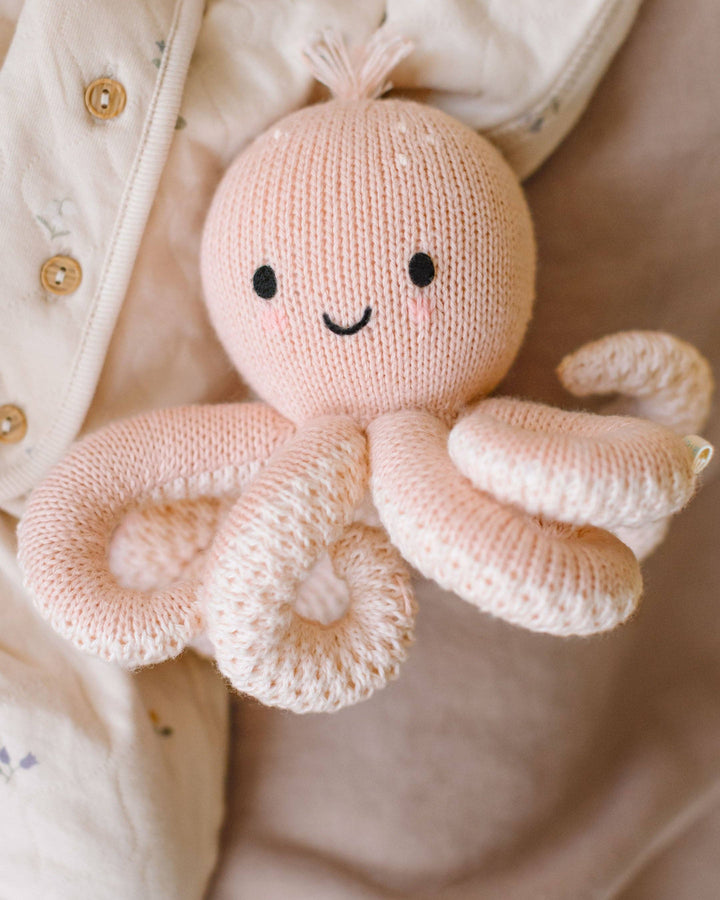 Octopus stuffed animal for little hands, Cuddle + Kind Baby Octopus in Soft Coral Pink, handmade in Peru and Nepal