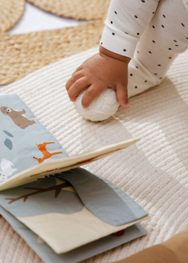 The Coco Village Baby First Toys Gift Box is a timeless gift for a new arrival, combining beauty and play in one unforgettable package.