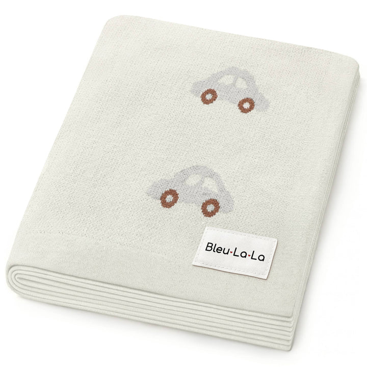 folded neutral soft knit cotton receiving newborn blanket with bleu la la label 