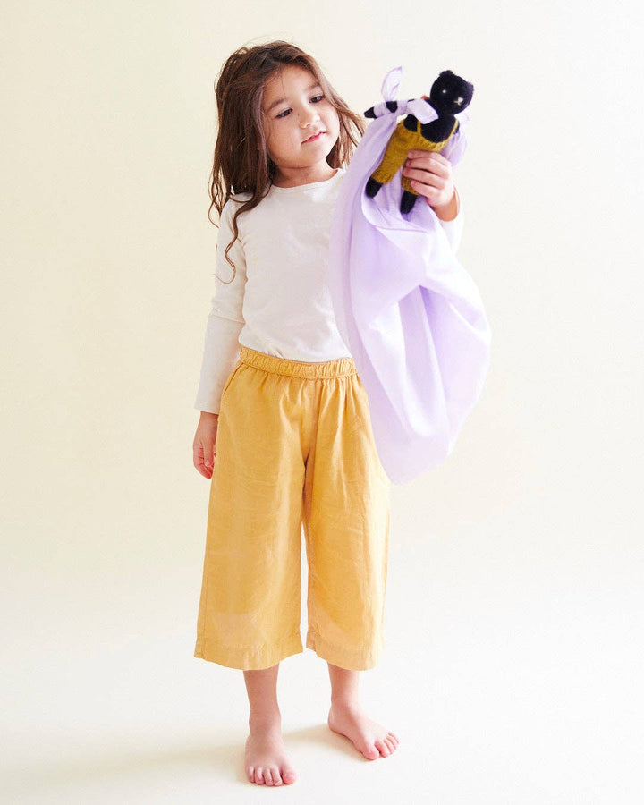 Sarah's Silks Solid Color Playsilks lavender scarf used as a pretend telescope, a top choice for creative play