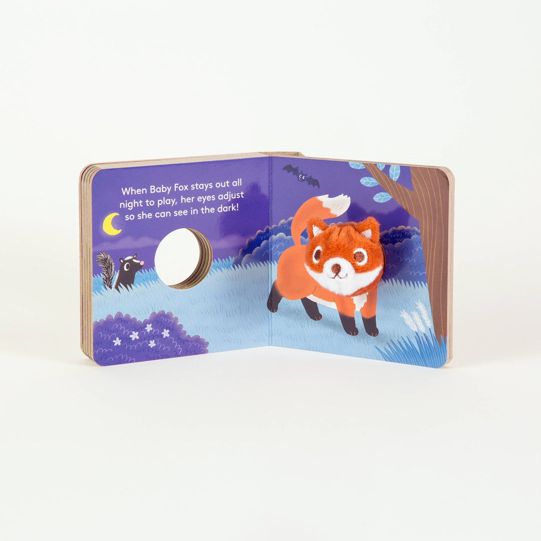 Nighttime forest spread from Baby Fox Finger Puppet Book featuring starry sky