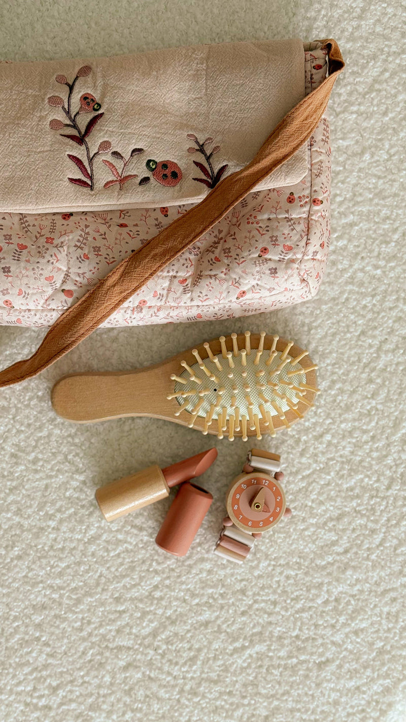 play pretend self-care accessories from egmont toys including emma watch, hair brush, and lipstick 