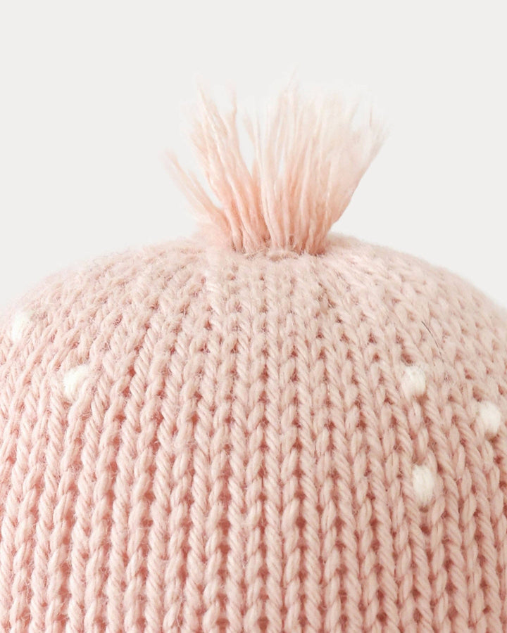 Hand-knit octopus stuffed animal: Cuddle + Kind Baby Octopus in Soft Coral Pink, a soft heirloom baby gift