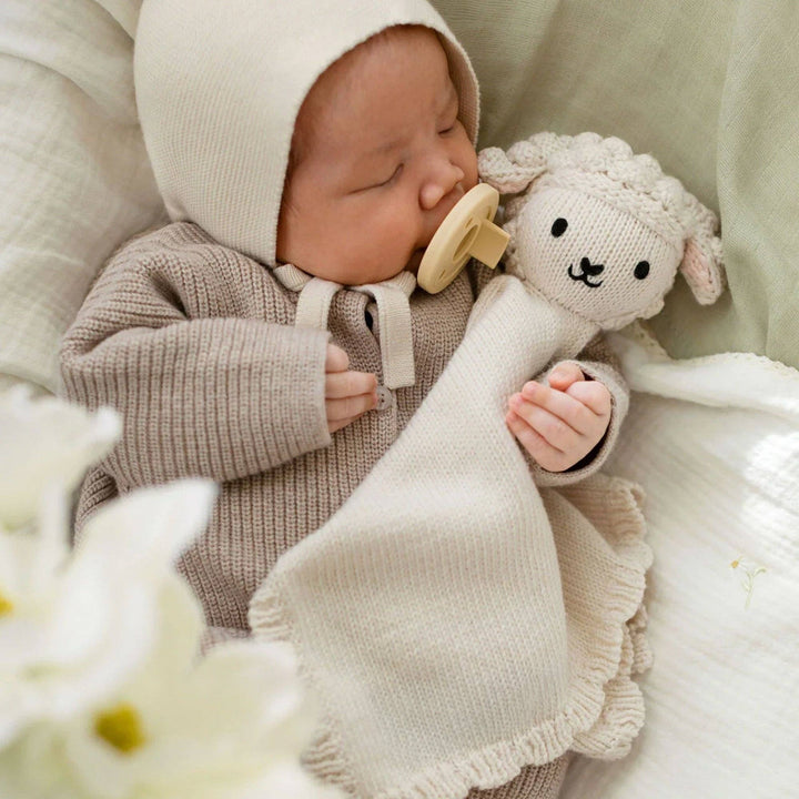 Hand-knit lamb lovey Cuddle + Kind — best baby shower gift heirloom-quality stuffed lovey blanket