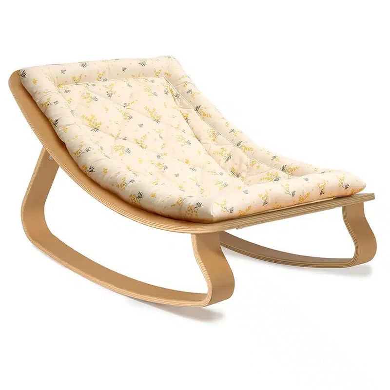 Soft texture detail on the Beech Wood Levo Rocker by Charlie Crane in mimosa, showing a rounded shape for infant comfort