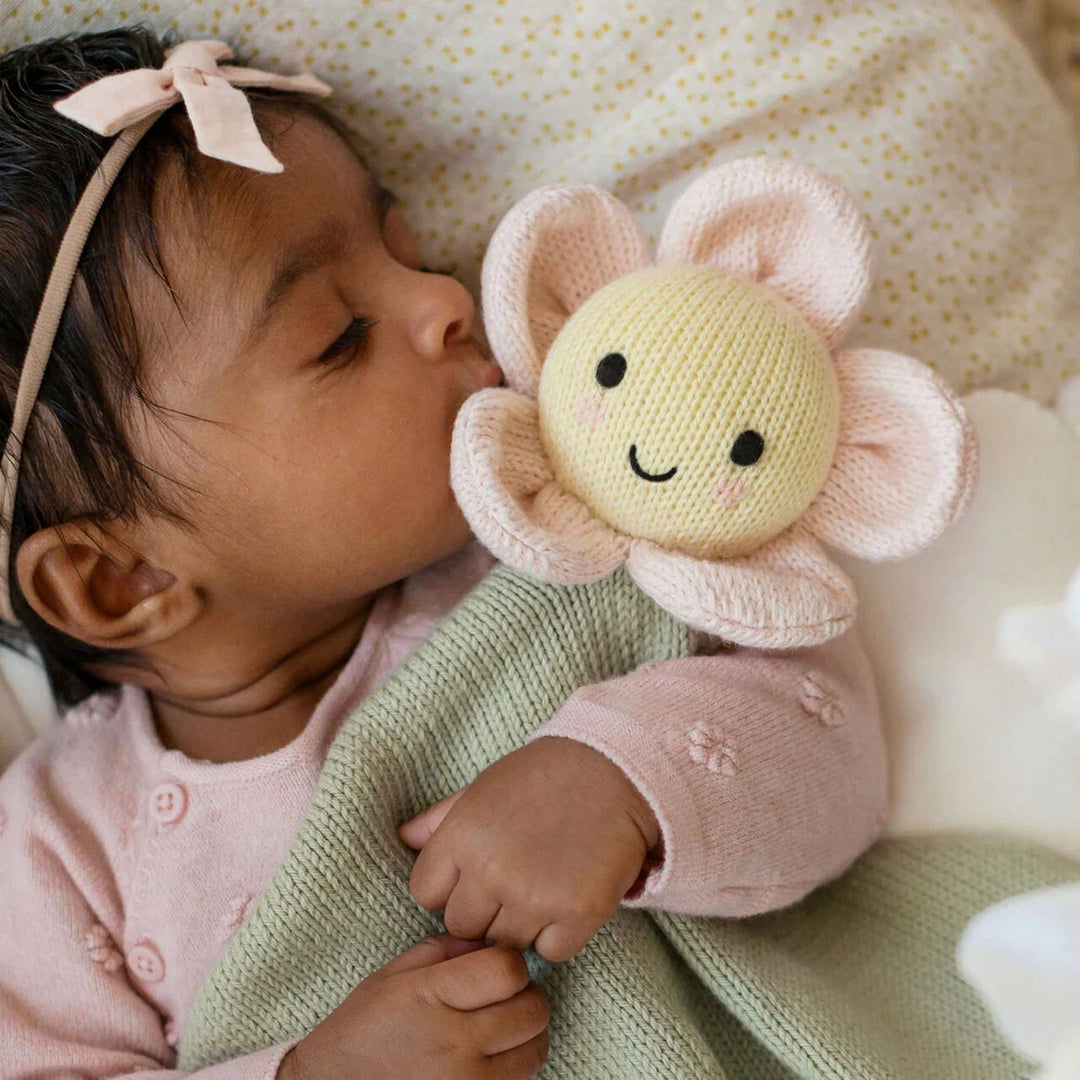 Blush daisy lovey blanket — Cuddle + Kind hand-knit pink plush lovey for newborn girls