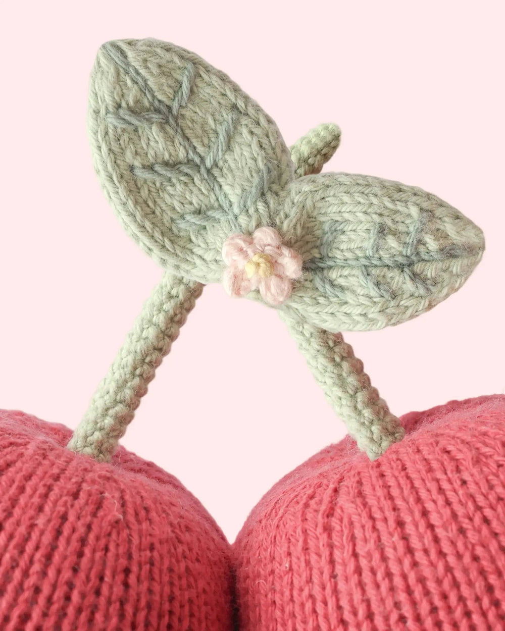Cuddle + Kind Baby Cherries, hand-knit cherry plush toy for babies