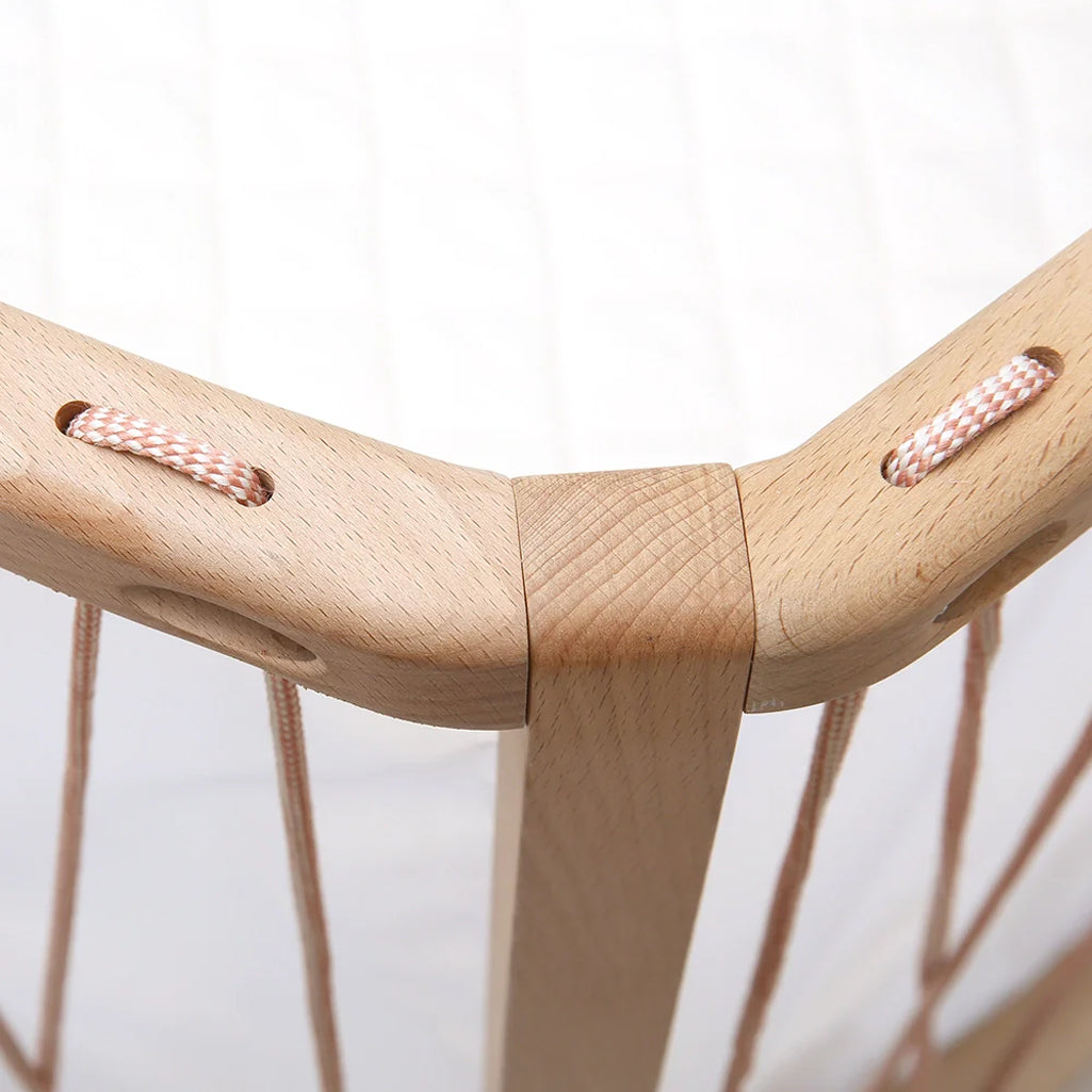 Desert nursery setup highlights the KIMI Evolving Baby Bed Charlie Crane as an infant to toddler bed with natural finish